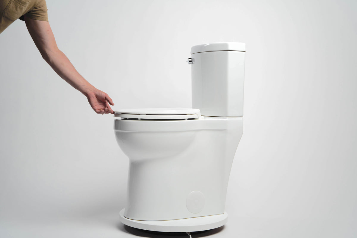 Convenient Height TOWER extra tall 21 inch skirted toilet with a concealed trapway and elongated seat