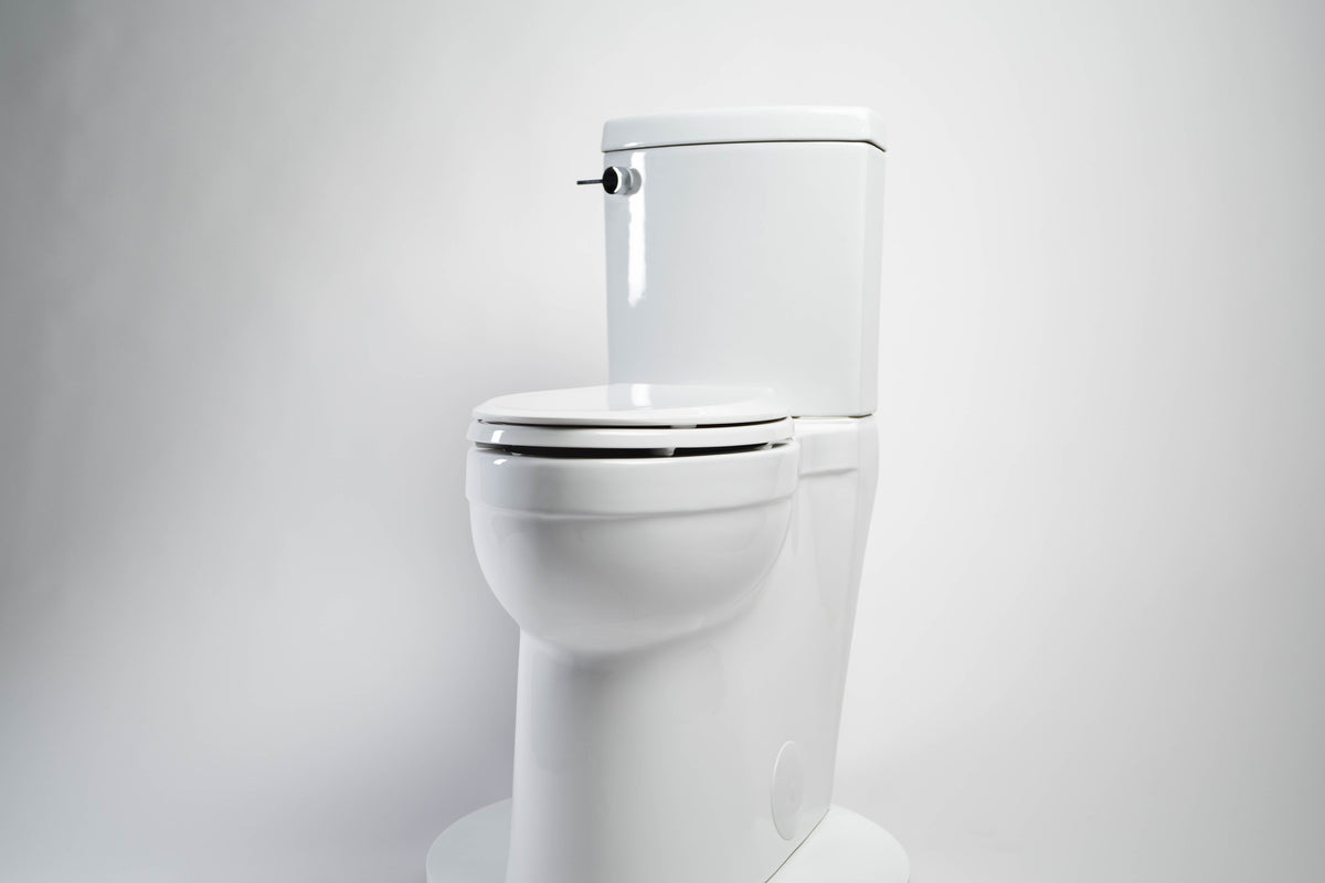 Elegant high angle shot of a luxury white porcelain toilet showcasing a sleek elongated extra high bowl design