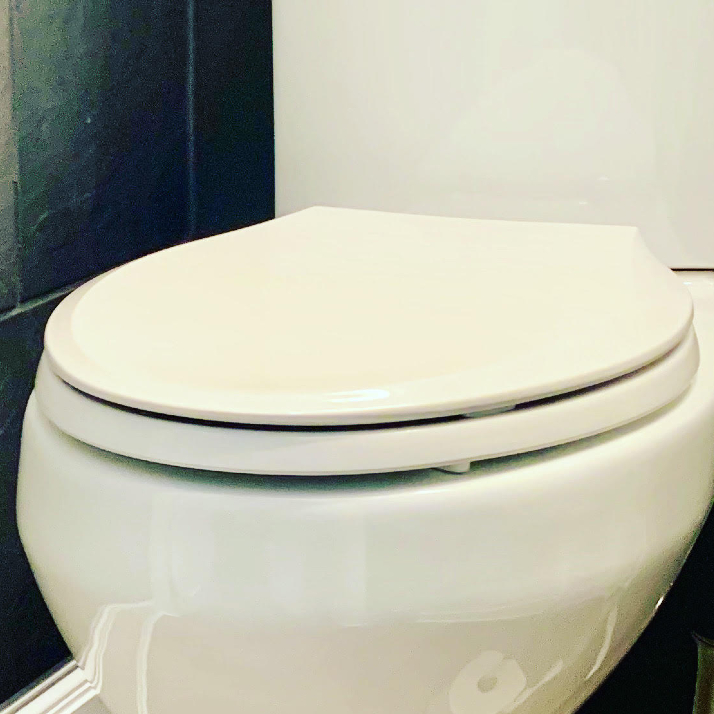 Slow close toilet seat and slow close lid prevents slamming