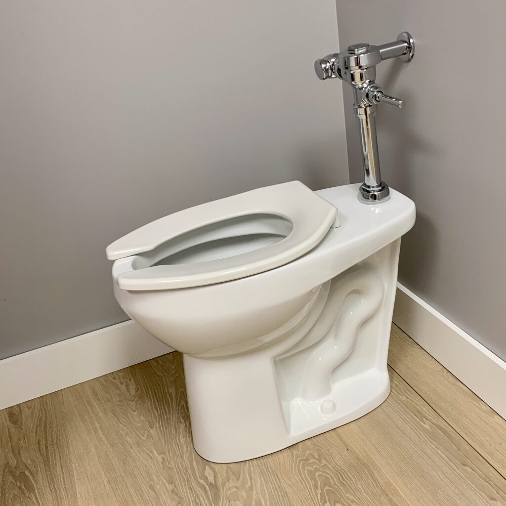 Measures 21.25 inch from floor to the top of the toilet seat